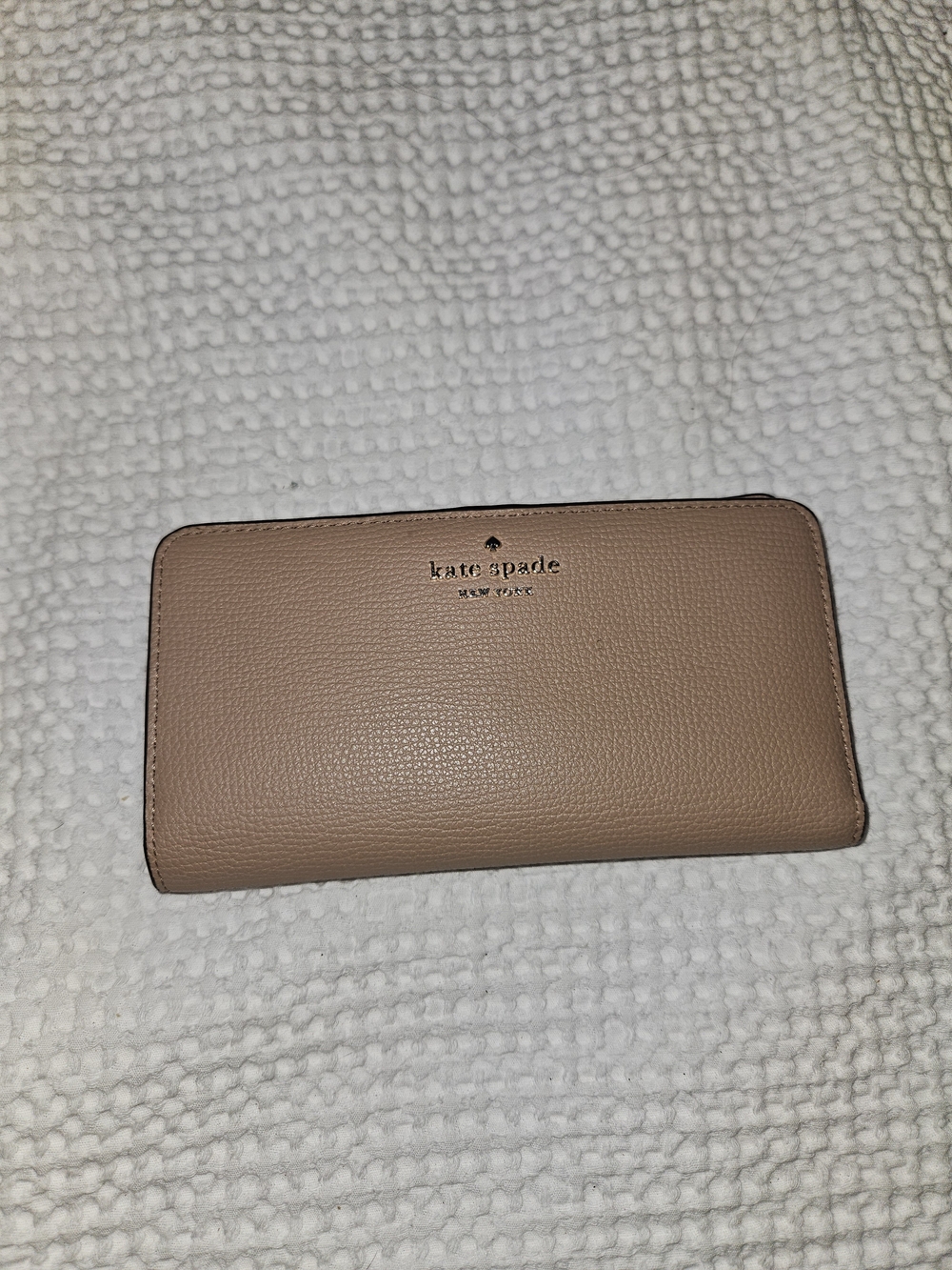 kate spade pebbled leather zip wallet in blush